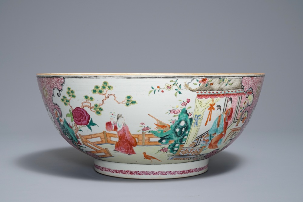 A large Chinese famille rose bowl with figures in a garden, Yongzheng