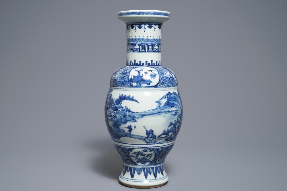 A Chinese blue and white vase with figures in a landscape, 19th C.