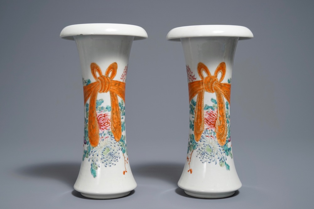 A pair of Chinese famille rose vases, Qianlong mark, 20th C.
