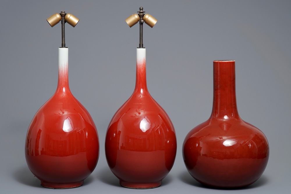 Three Chinese sang-de-boeuf-glazed bottle vases, 20th C.