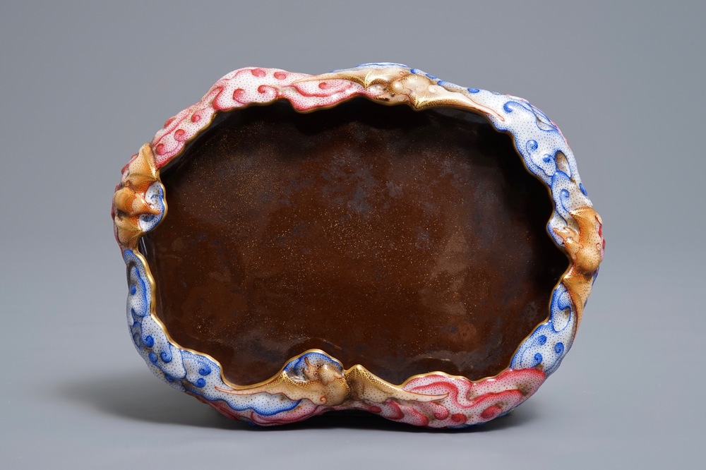 A Chinese famille rose brush washer with moulded design of bats, Qianlong mark, 20th C.