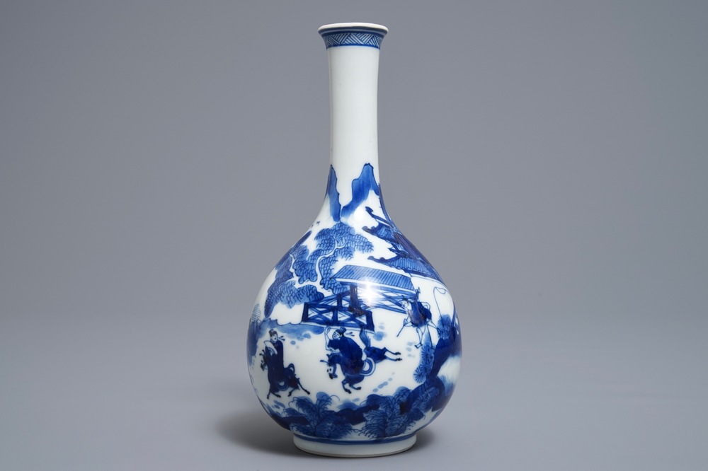 A Chinese blue and white bottle vase with figures in a landscape, Kangxi