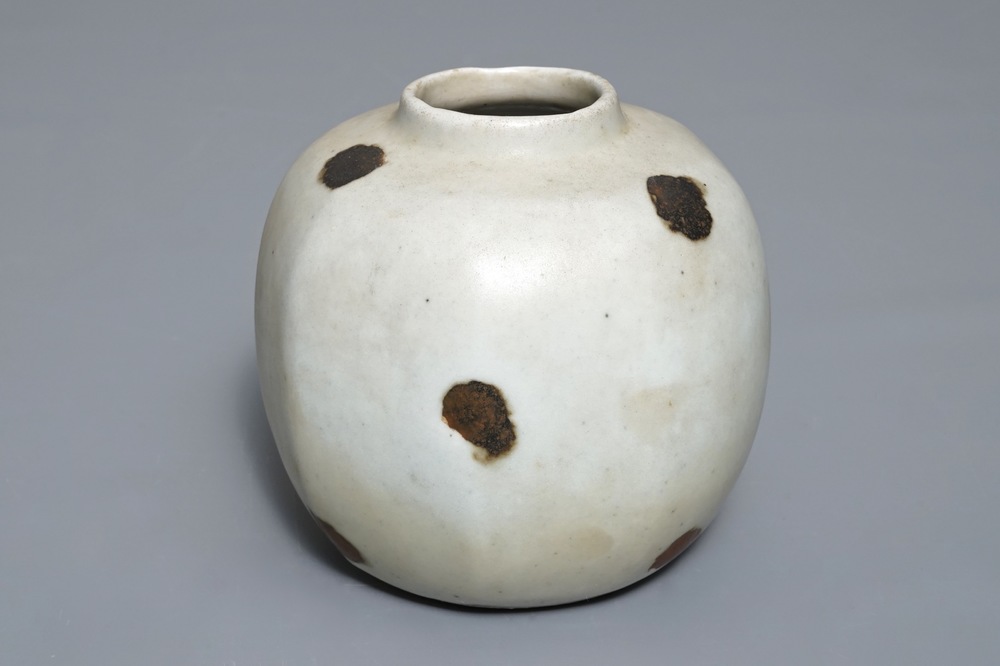 A Chinese qingbai iron spot jar, Yuan
