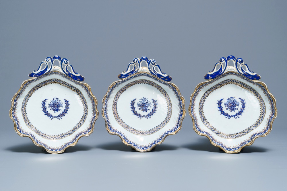 Three Chinese neo-classical gilt, blue and white tripod fruit dishes, Qianlong
