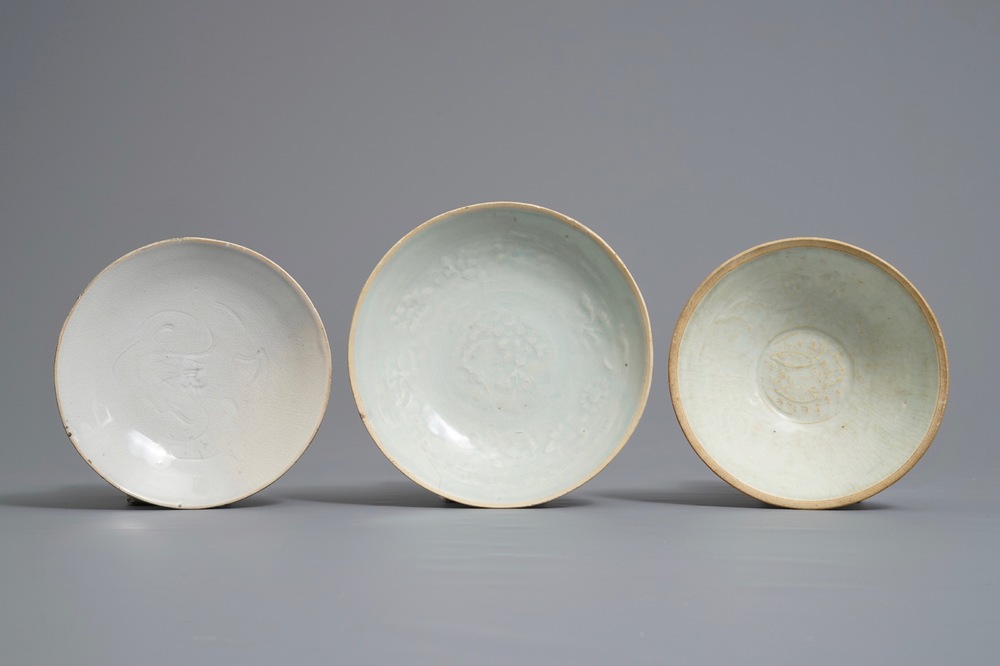 Two Chinese qingbai bowls and a plate with underglaze design, Song