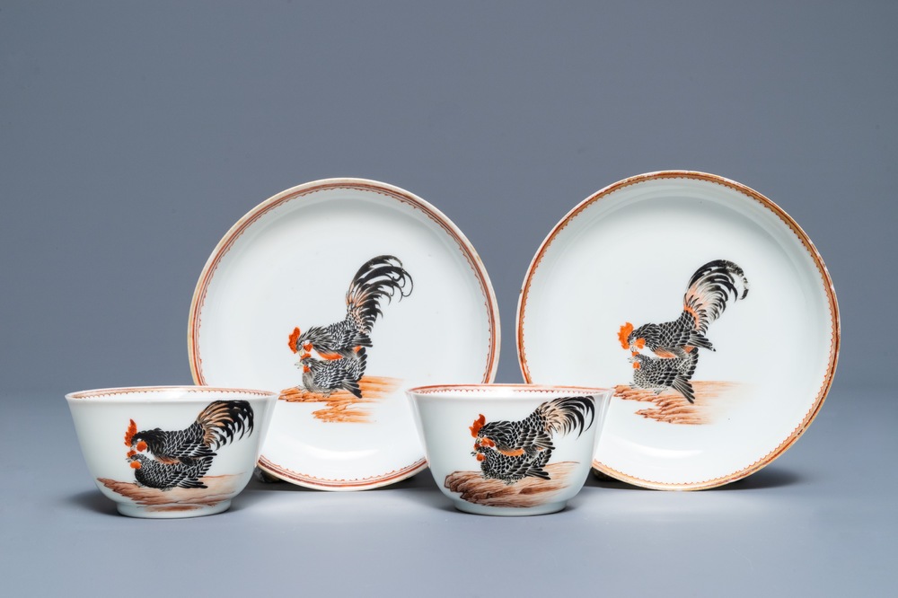 A pair of fine Chinese cups and saucers with roosters and chickens, Qianlong