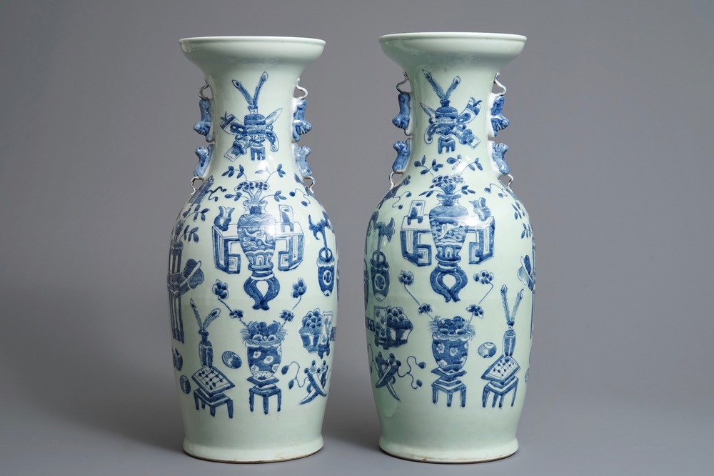 A pair of Chinese blue and white on celadon ground vases, 19/20th C.