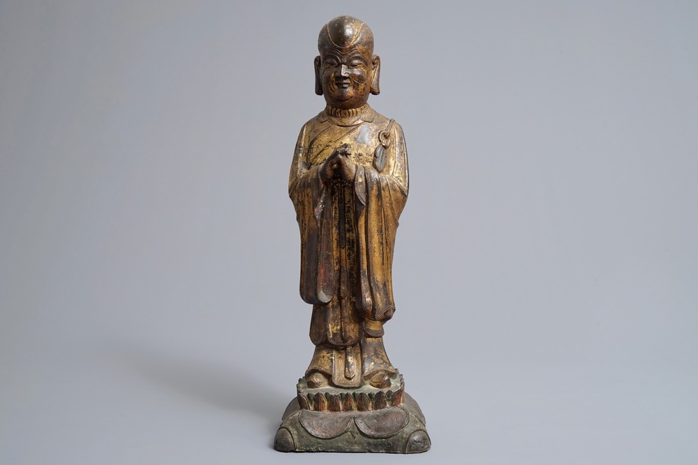 A large Chinese gilt bronze figure of Mahakasyapa, Ming