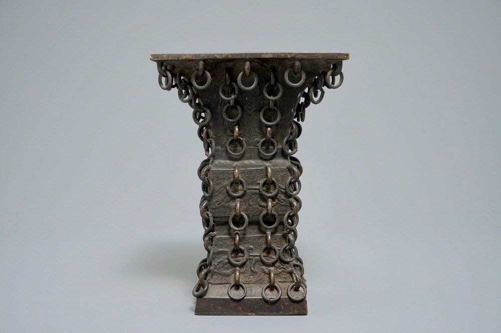 A Chinese archaistic ringed bronze fanggu vase, Ming