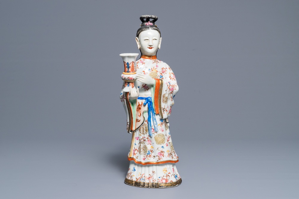 A large Chinese famille rose candle holder modelled as court lady, Qianlong