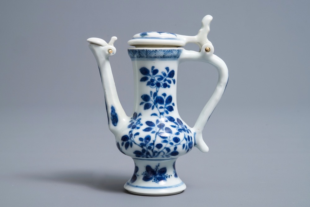 A Chinese blue and white jug and cover after a pewter example, Kangxi