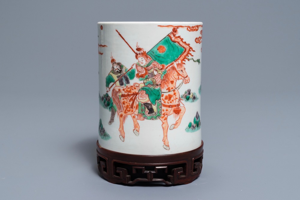 A Chinese famille verte brush pot on wooden stand, Kangxi