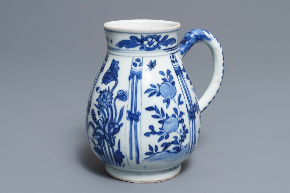 A Chinese blue and white jug with floral design, Wanli