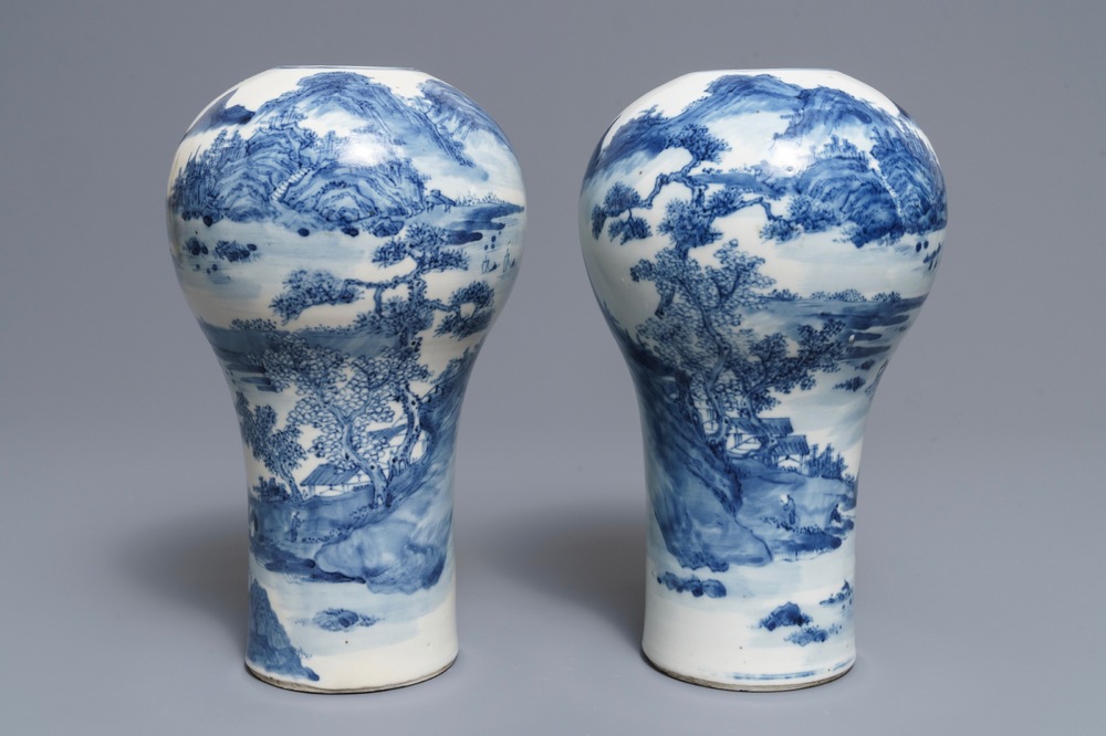 A pair of Chinese blue and white landscape vases, 19/20th C.