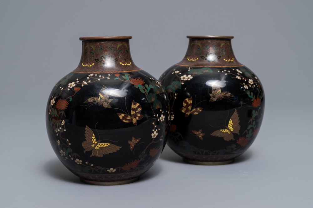 A pair of Japanese cloisonn&eacute; 'butterfly' vases, Meiji, 19th C.