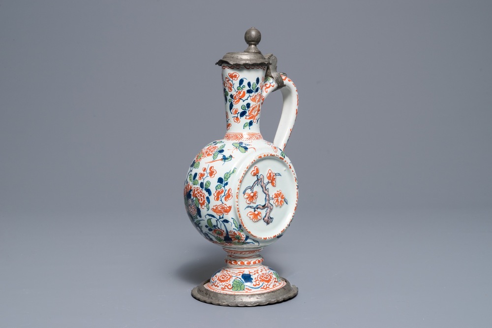 A pewter-mounted Dutch Delft cashmere palette relief-decorated jug, 1st half 18th C.