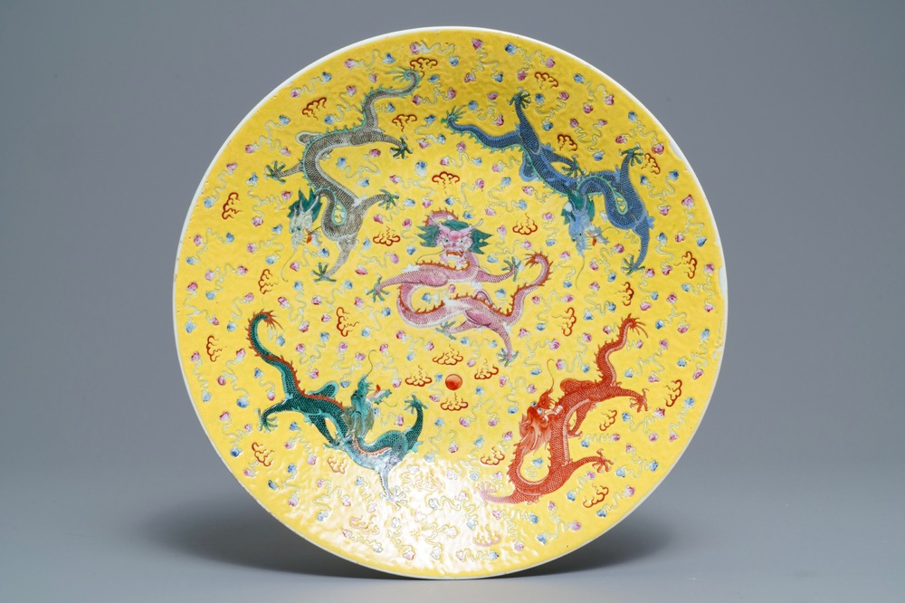 A Chinese famille rose yellow-ground dragon charger, Guangxu mark, 19/20th C.