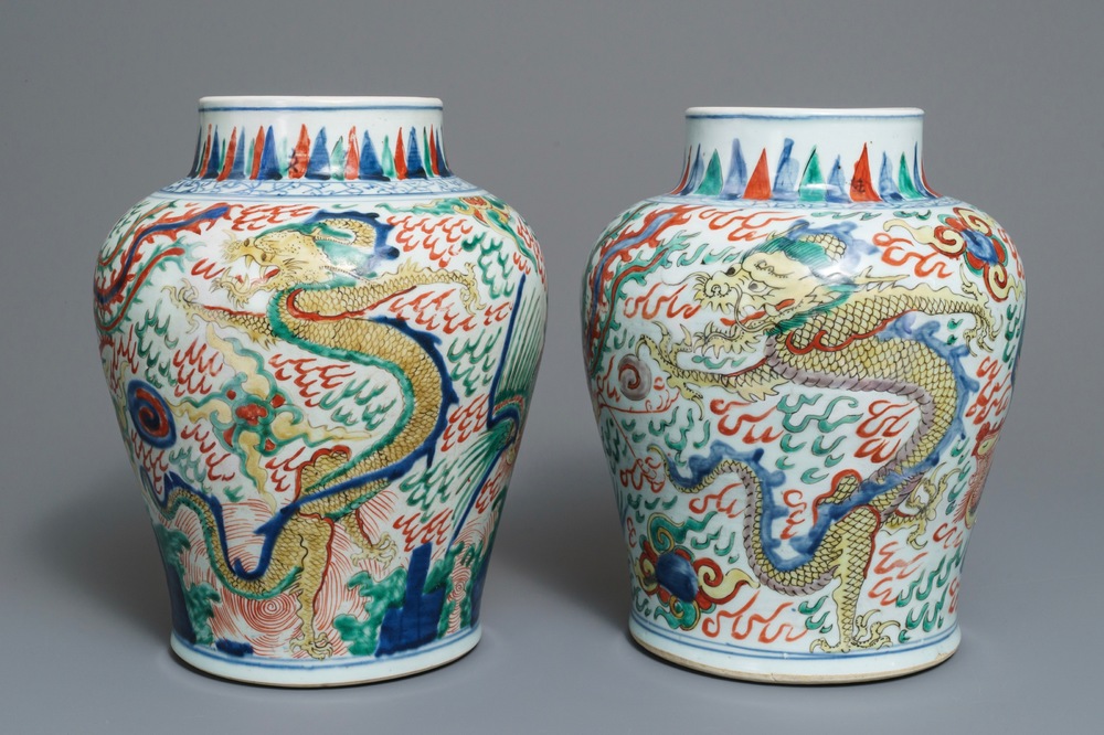 A pair of Chinese wucai &lsquo;dragon and phoenix&rsquo; vases, Transitional period
