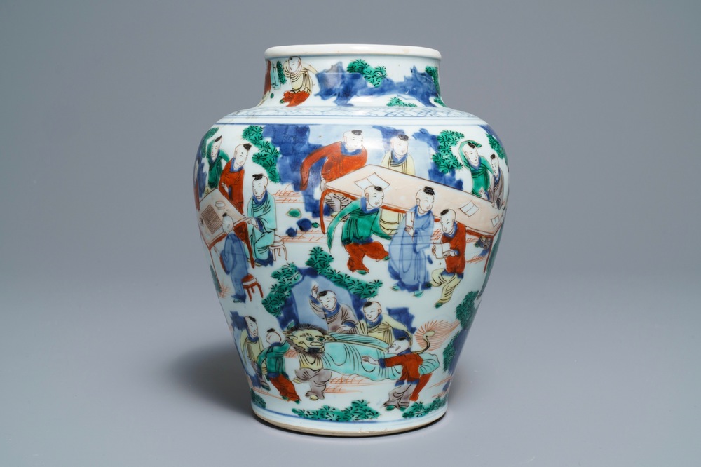 A Chinese wucai '100 boys' baluster vase, Transitional period