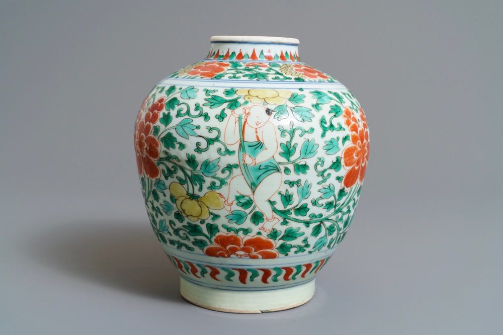 A Chinese wucai jar with boys among peonies, Transitional period