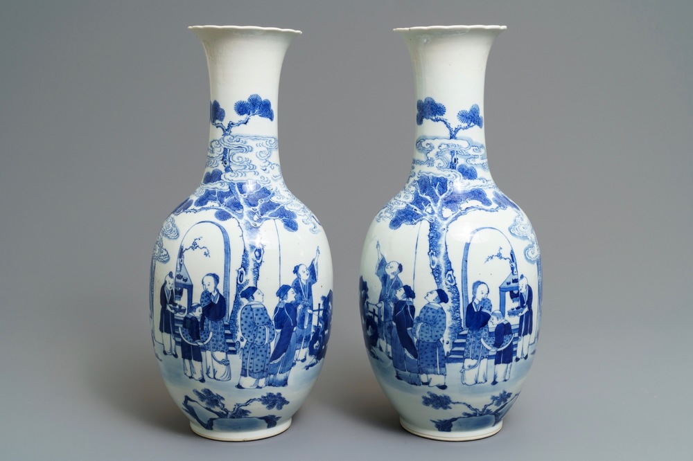 A pair of Chinese blue and white bottle vases, Kangxi mark, 19th C.