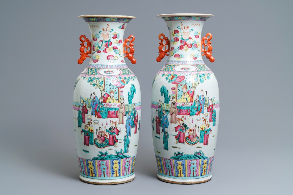 A pair of Chinese famille rose court scene vases, 19th C.