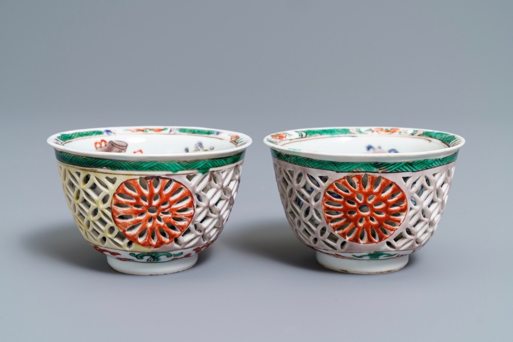 A pair of reticulated double-walled Chinese famille verte cups, Kangxi