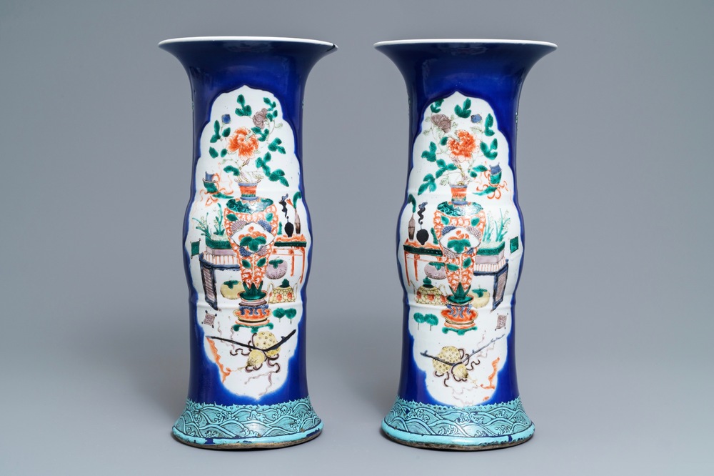 A pair of Chinese famille verte powder blue-ground gu vases, Kangxi mark, 19th C.