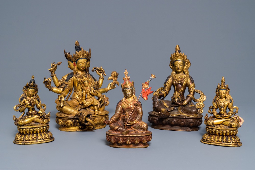 Five Sino-Tibetan gilt bronze Buddha figures, 19/20th C.
