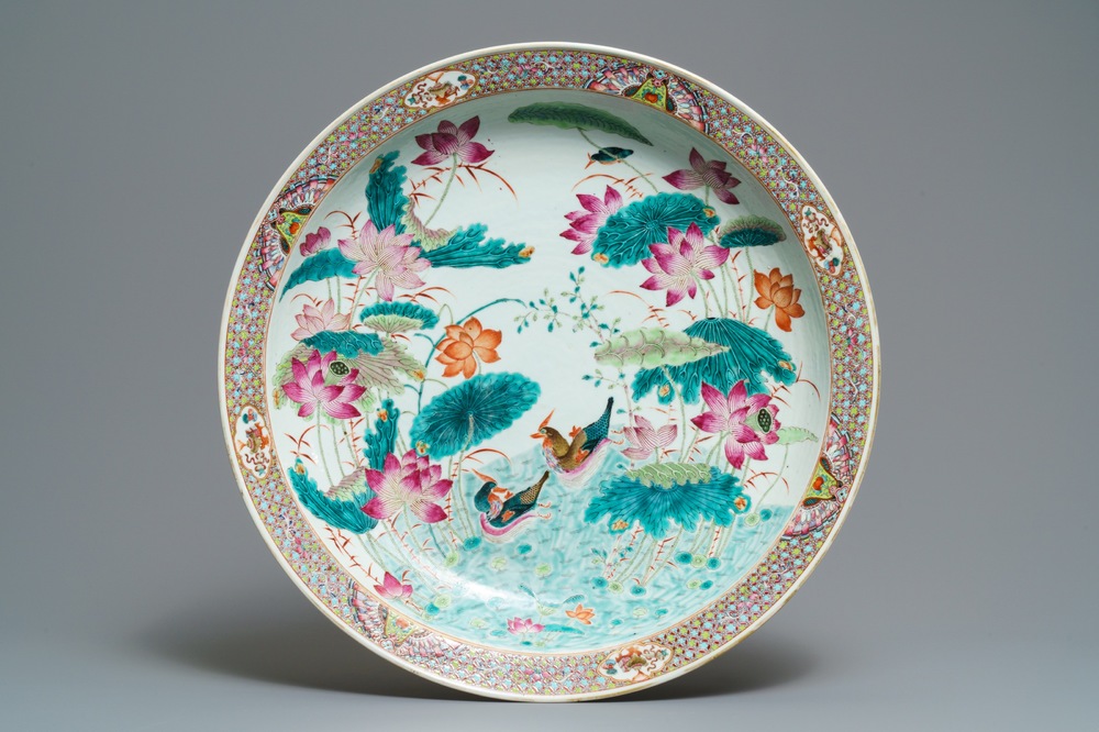 A massive Chinese famille rose 'ducks in a lotus pond' charger, Qianlong mark, 19th C.