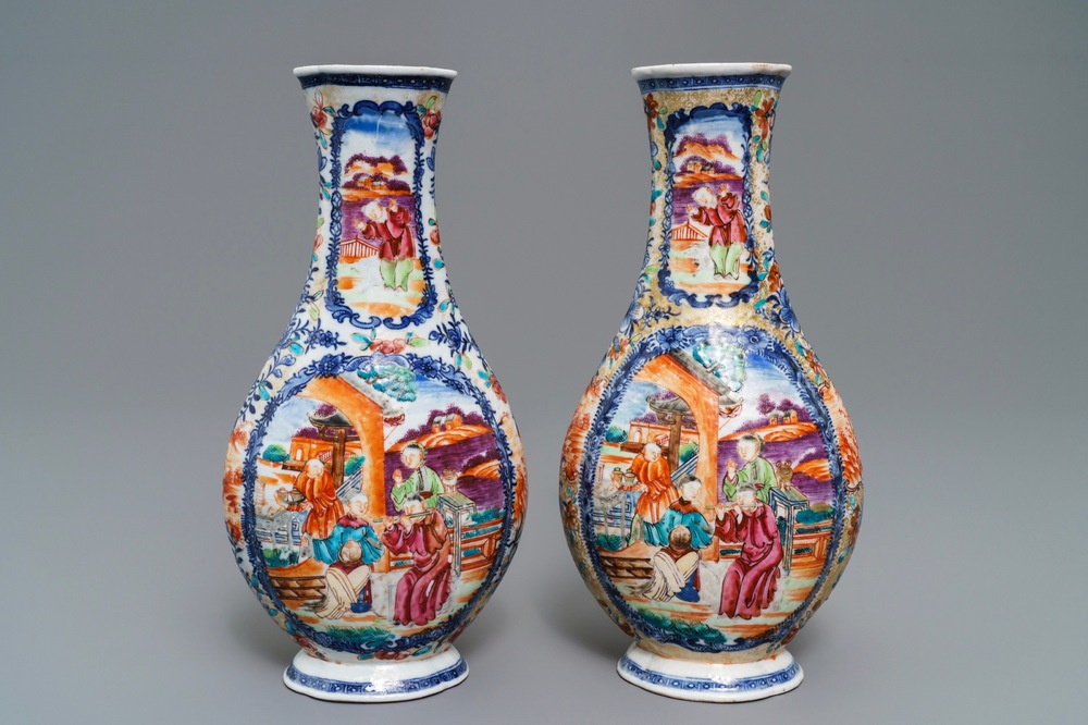 A pair of Chinese famille rose 'mandarin' vases, Qianlong
