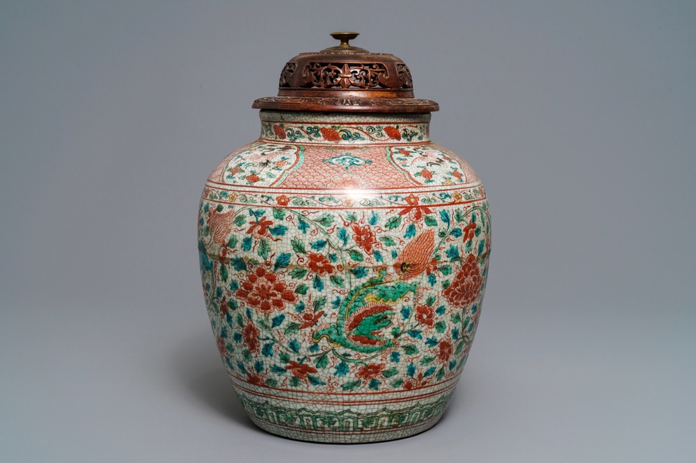 A Chinese polychrome Swatow jar with Buddhist lions among peony scrolls, Ming