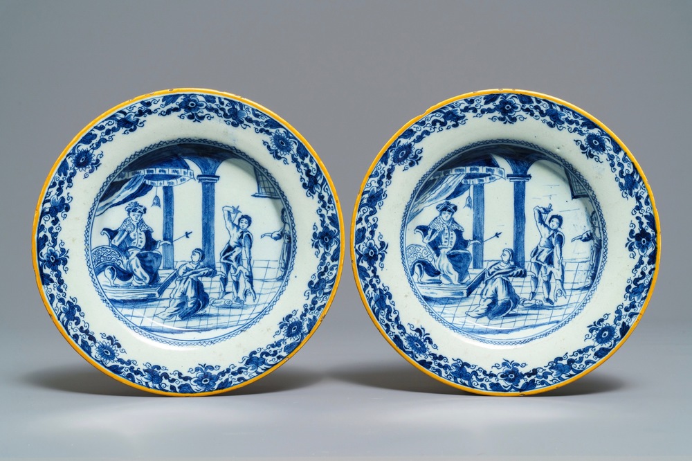 A pair of Dutch Delft blue and white 'Judgment of Solomon' plates, 18th C.