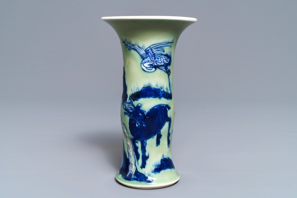 A Chinese blue, white and underglaze red celadon-ground gu vase, Kangxi