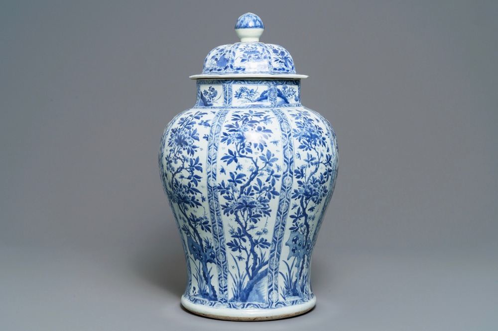 A large Chinese blue and white baluster jar and cover with floral panels, Kangxi