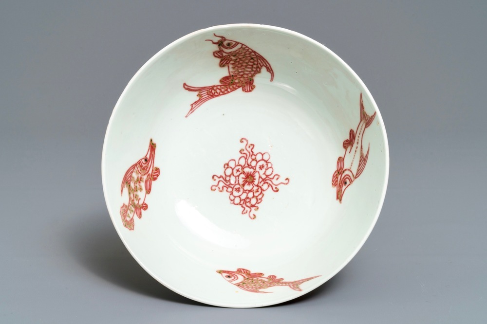 A Chinese underglaze red 'dragons and fish' bowl, 19/20th C.