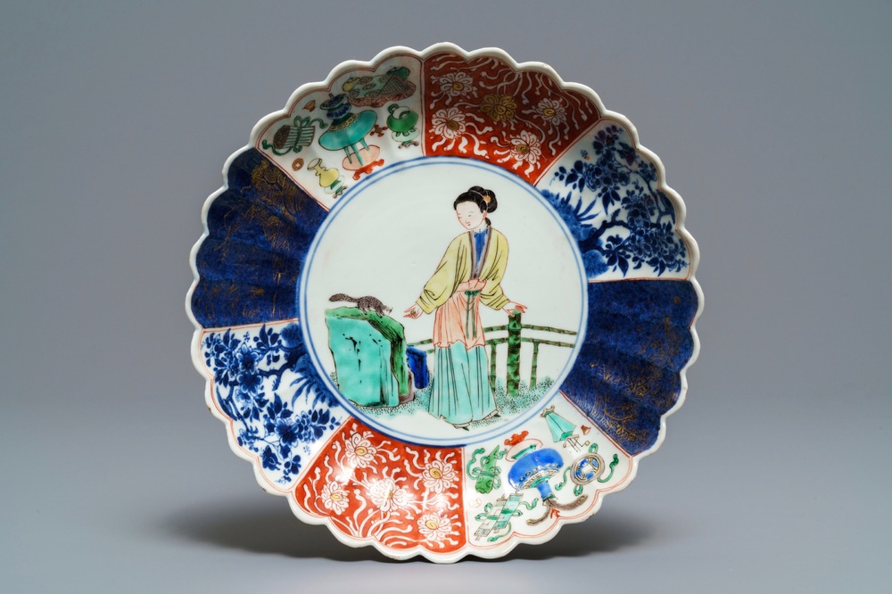 A Chinese verte-Imari 'lady and squirrel' plate, Kangxi