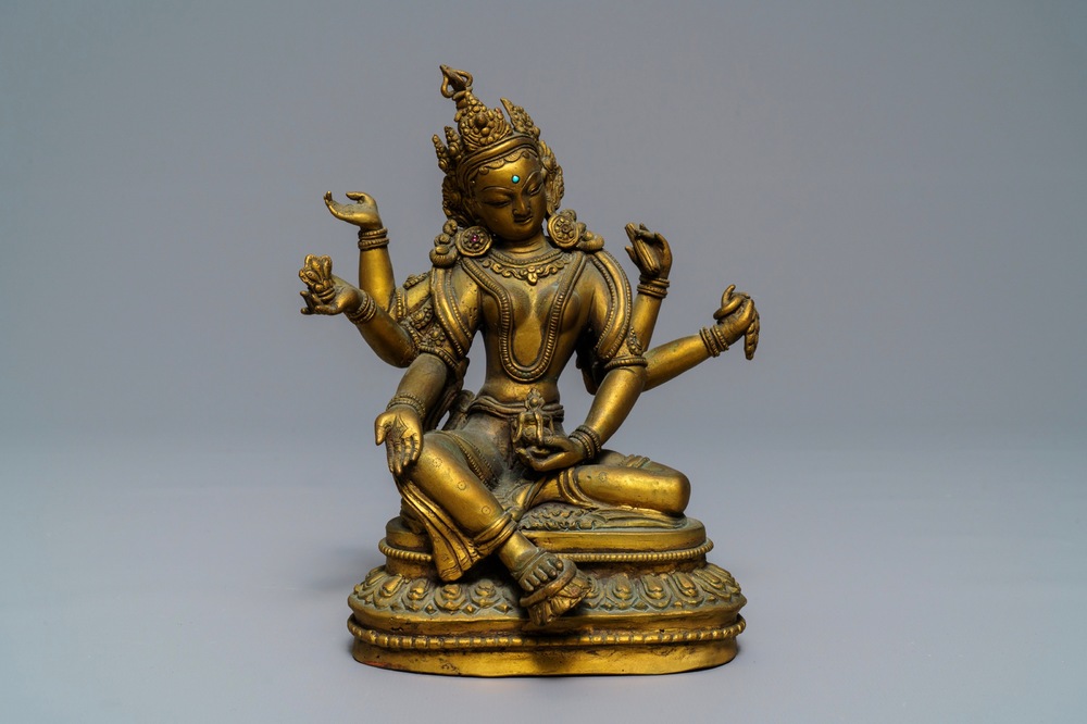Une figure de Vasudhara en bronze dor&eacute; incrust&eacute;, Tibet ou N&eacute;pal, 18/19&egrave;me