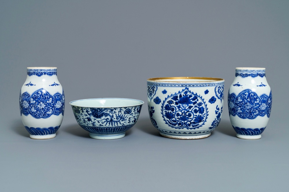 A pair of Chinese blue and white vases and two bowls, Kangxi