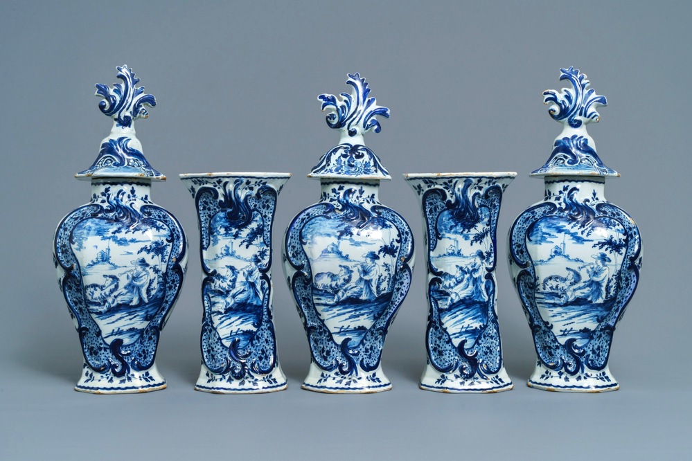 A Dutch Delft blue and white five-piece garniture with pastoral design, 18th C.