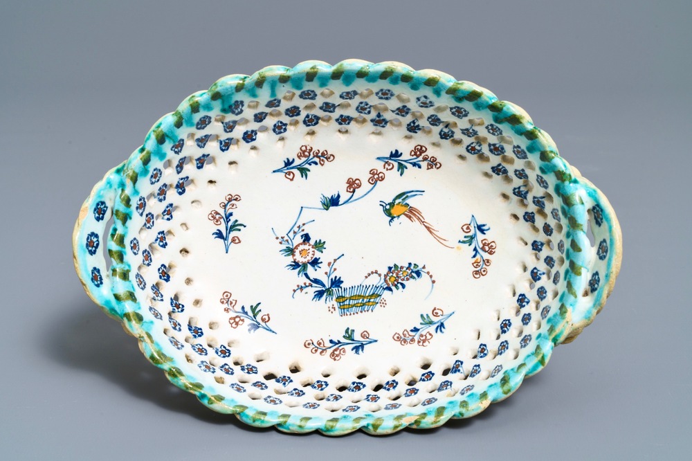 A polychrome Brussels faience '&agrave; la haie fleurie' basket, 18th C.