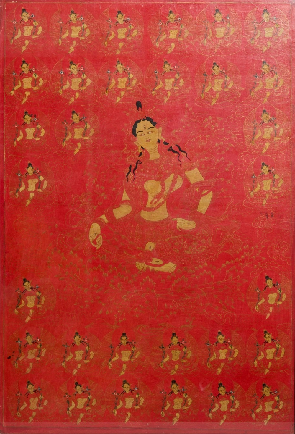 Een thangka met Groene Tara op rode fondkleur, Tibet, 17/18e eeuw