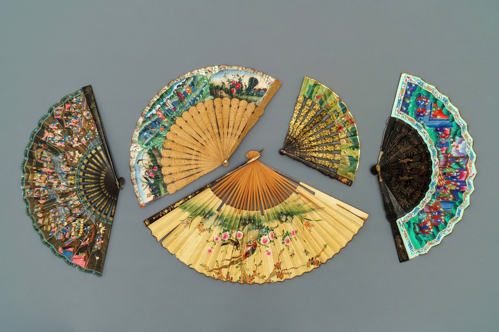 Five Chinese painted paper, wood and lacquer fans, Canton, 19th C.