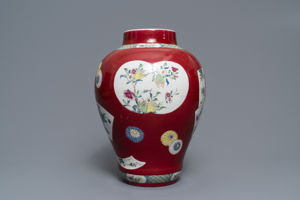 A fine Chinese famille rose ruby ground baluster vase with floral panels, Yongzheng