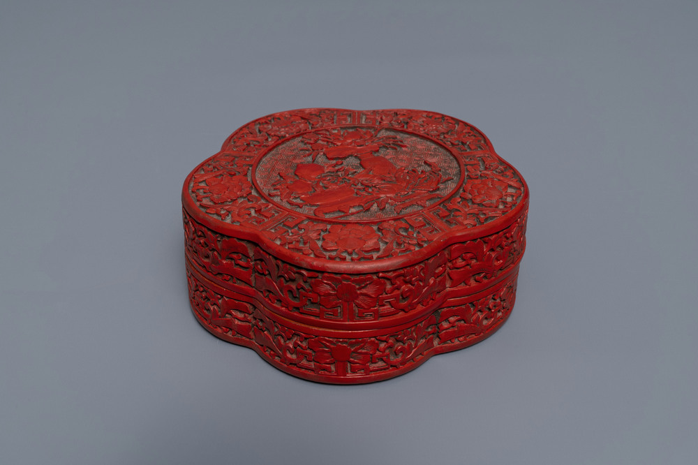 A Chinese carved cinnabar lacquer box and cover, Wanli mark, 18/19th C.