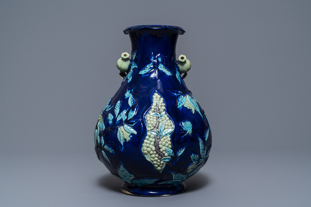 A Chinese fahua relief-decorated vase, 19th C.