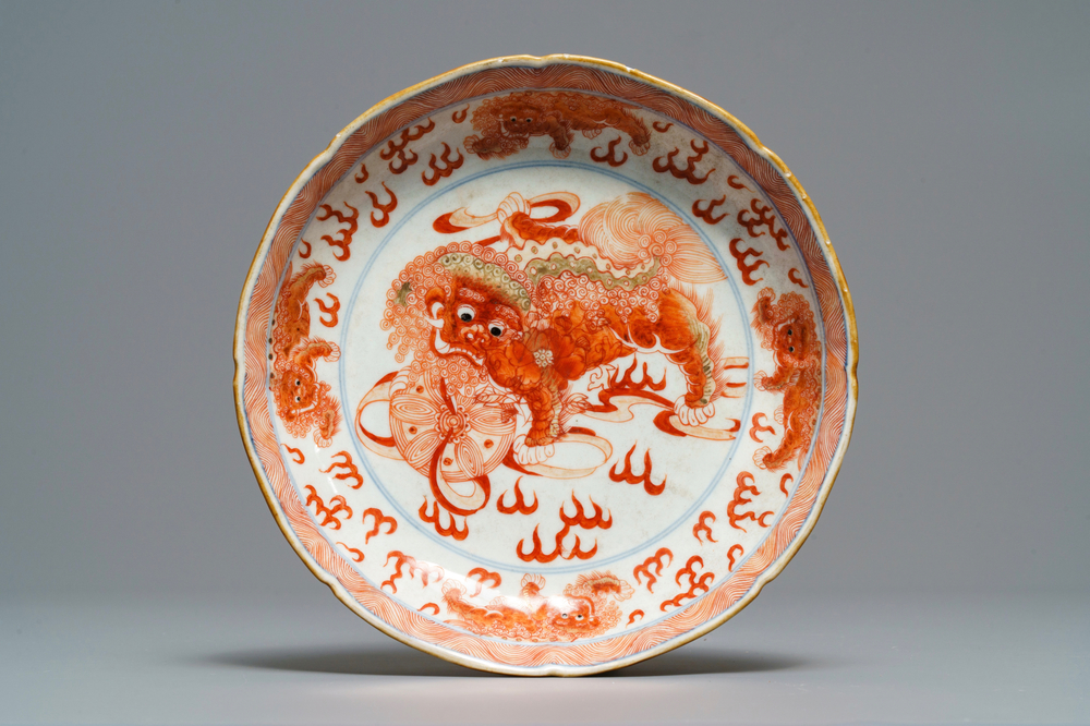 A Chinese blue, white and iron red 'Buddhist lion' plate, Qianlong mark, 18/19th C.