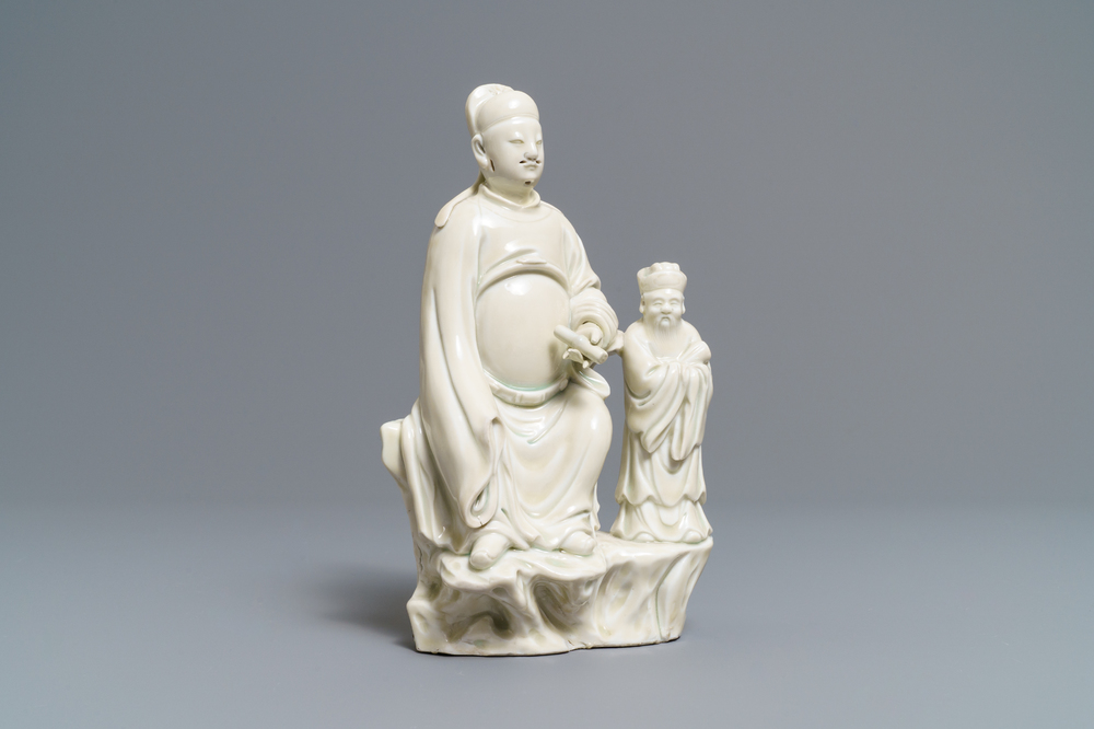 Een Chinese Dehua blanc de Chine groep met Wenchang Wang en Guixing, Kangxi
