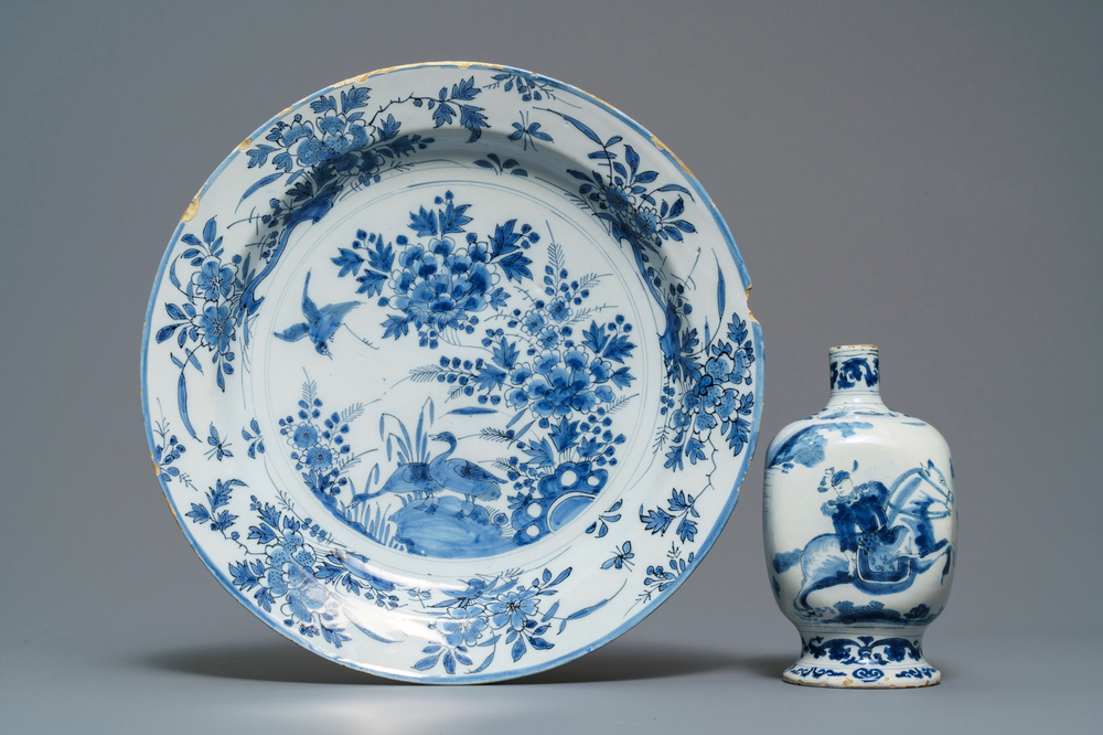 A Dutch Delft blue and white chinoiserie vase and a dish, late 17th C.