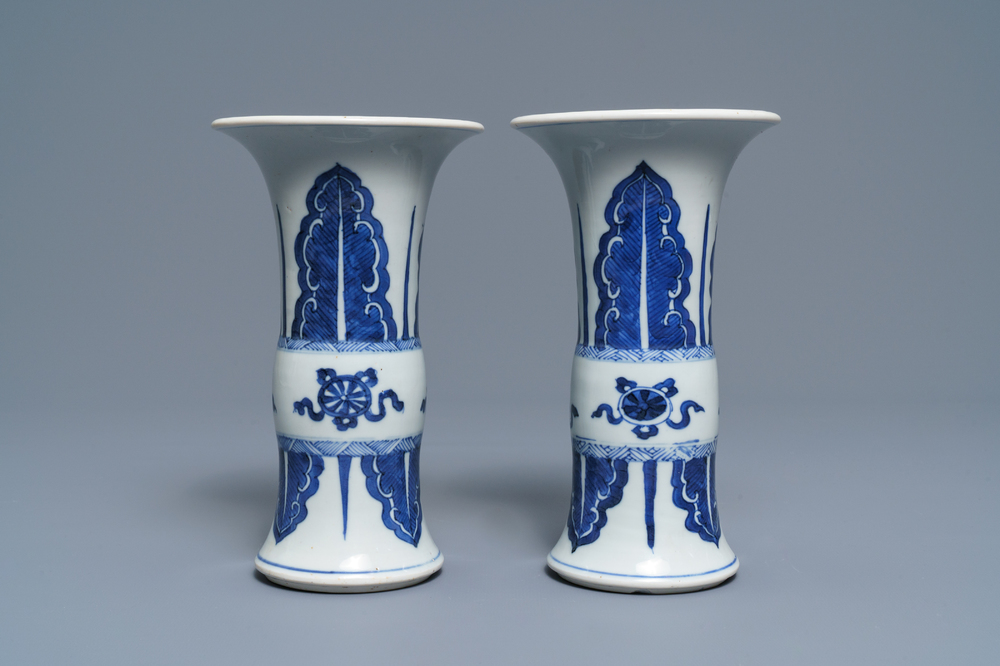 A pair of Chinese blue and white 'gu' vases, Kangxi